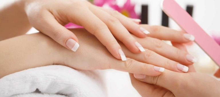 Image of hands & nails getting manicure
