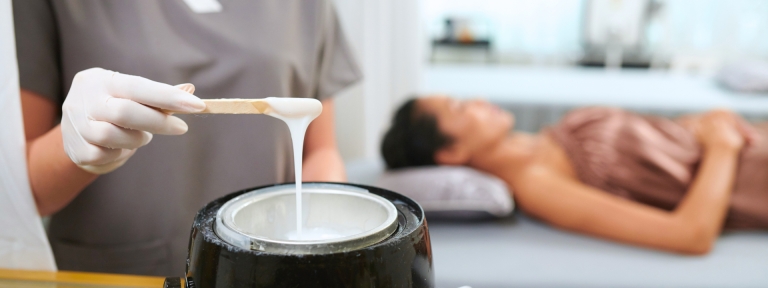 Woman getting waxed